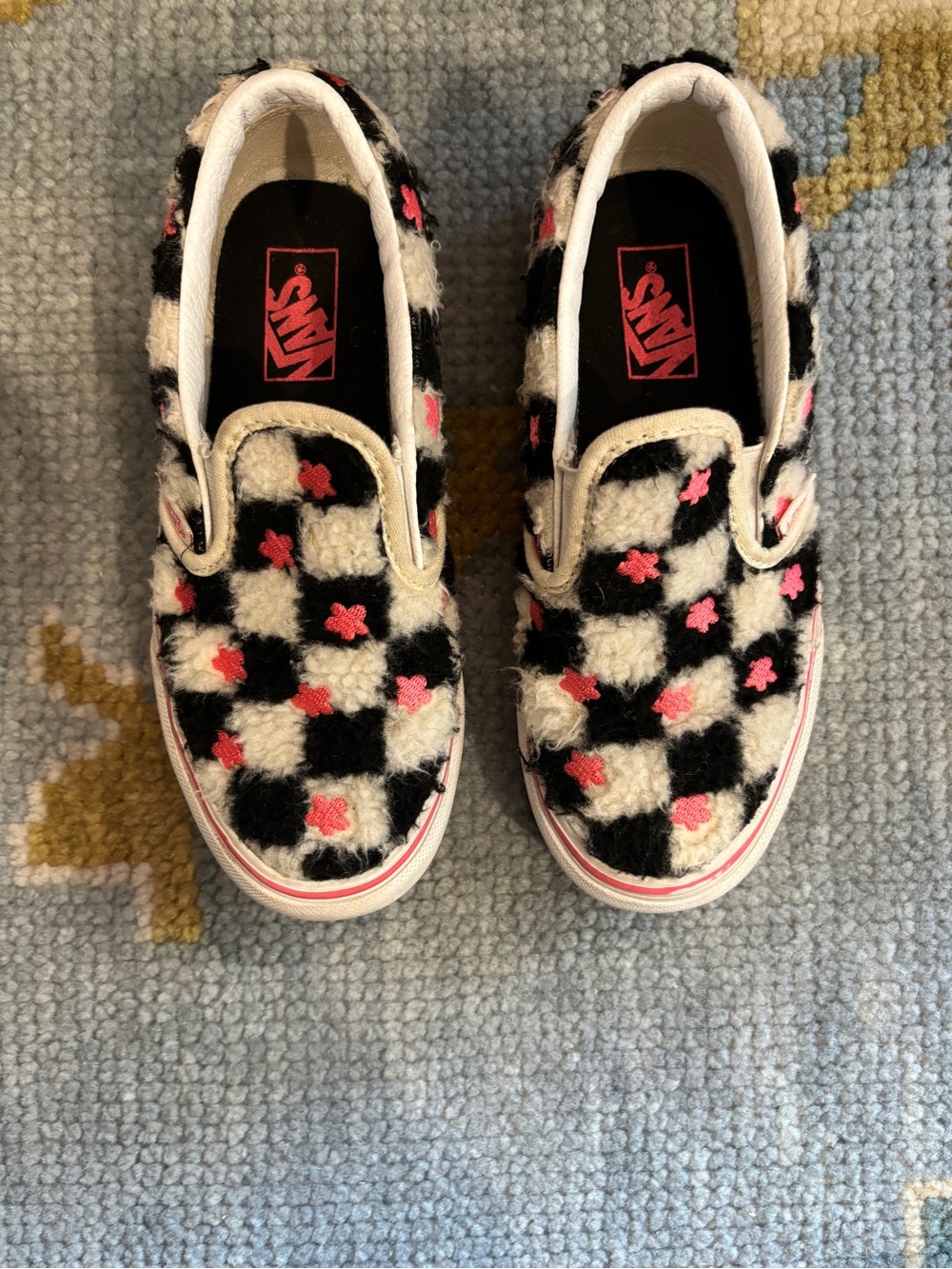 Vans Kids Fuzzy Checkerboard Slip-On Sneakers in Black, White & Pink